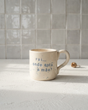 Caneca de cerâmica modelo Francisca da Tia Cila, com salpicado colorido e a frase gravada "pai... onde está a mãe?"
